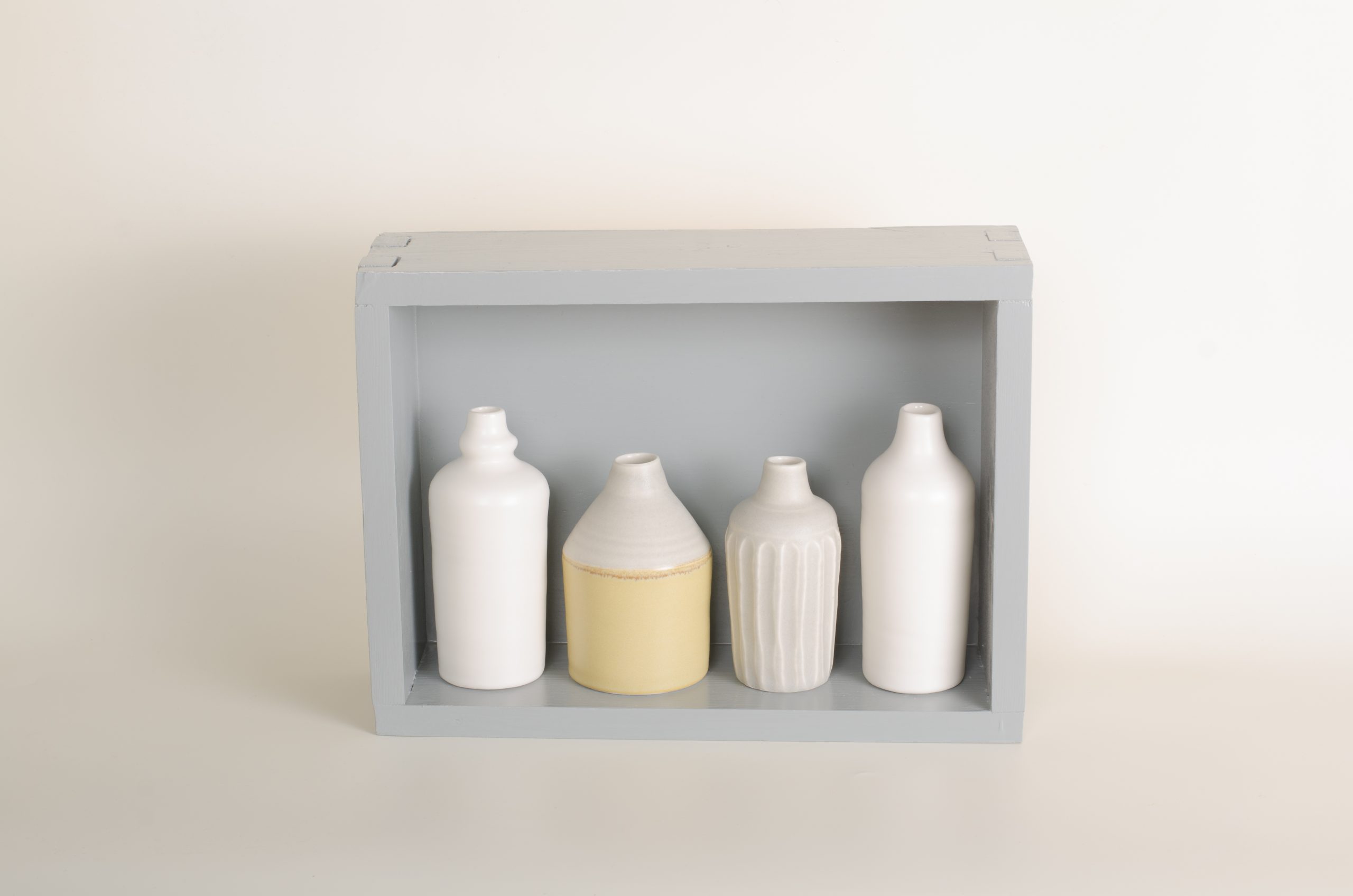 Hand thrown bottles, in white, grey and mustard, inspired by morandi paintings.
